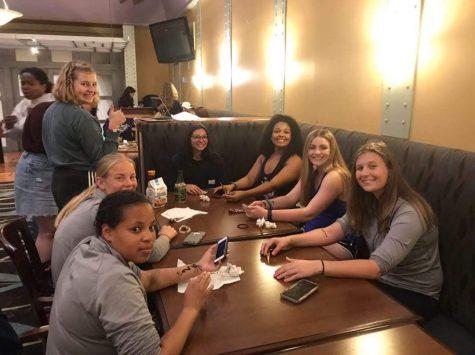 A group of students bonding and designing henna art. Photo credit: Lauren Comito