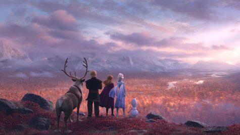 Sven, Kristoff, Anna, Elsa, and Olaf look into the distance. Photo credit: Disney Movies