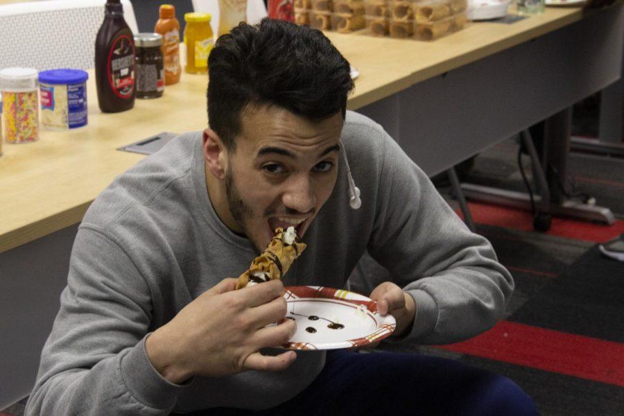 New recruit Tyler chomps down on the perfectly prepared pastry. Moon, PA. February 6, 2020.