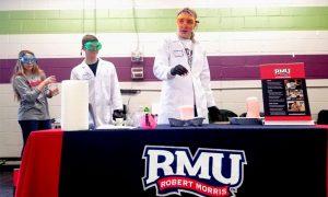 Several Robert Morris University students volunteer for No School STEM Day. 

Photo Credit: (Sarah Moore)