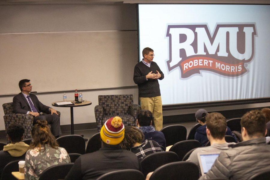Former Congressman Keith Rothfus speaking to RMU students on campus in Hopwood Hall with Professor Philip Harold