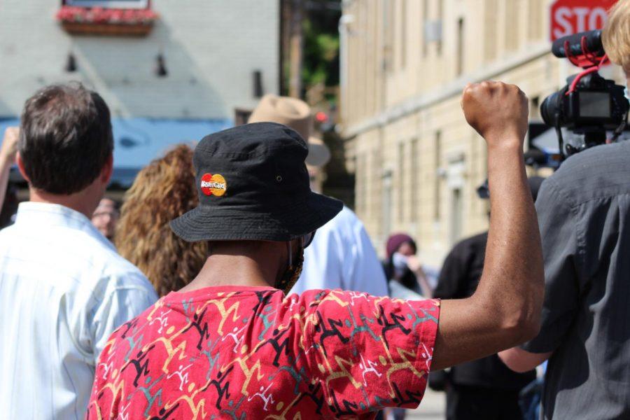 A protester raises his fist in solidarity with speakers. Coraopolis, PA. June 6, 2020. RMU Sentry Media/Garret Roberts 