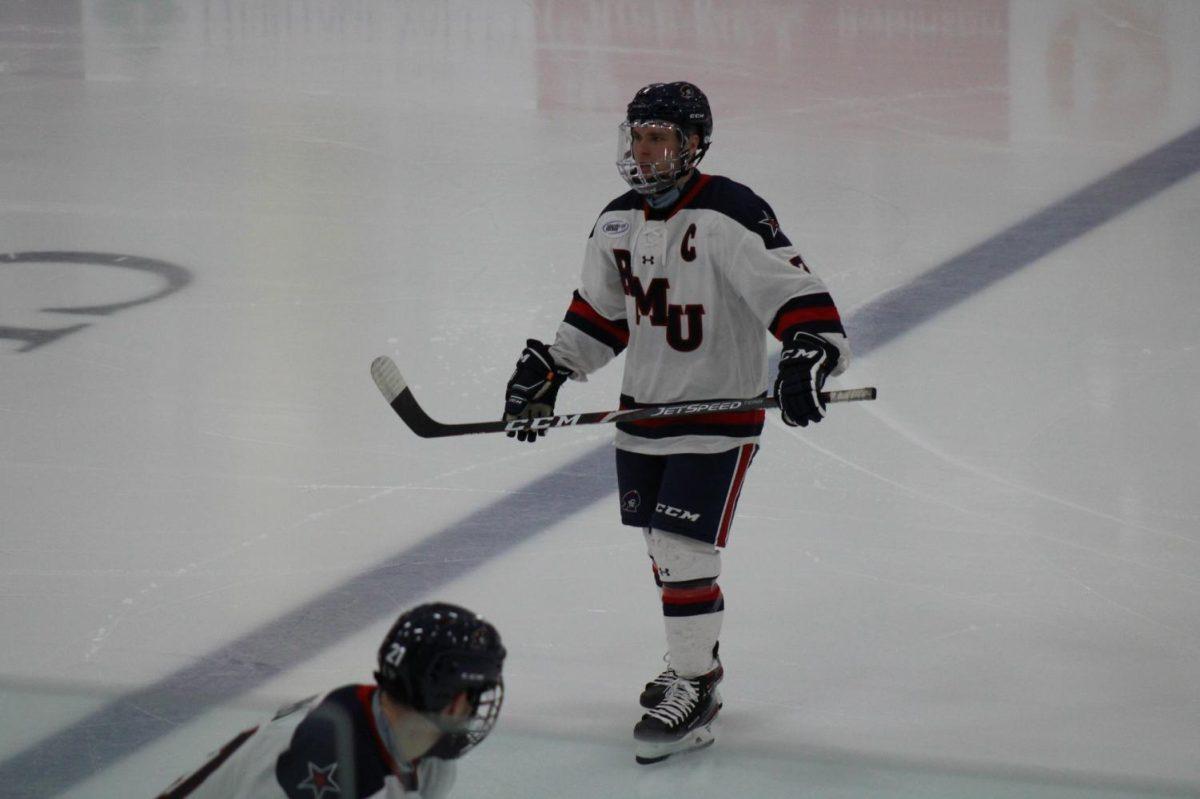 Nick Jenny scored a goal in mens hockeys 5-2 loss to Canisius in their AHA opener. Photo credit: Nathan Breisinger