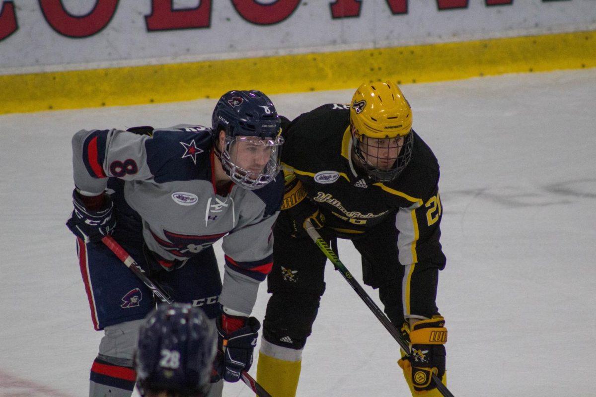 RMUs Aidan Spellacy and AICs Tobias Fladeby line up for a faceoff on January 25, 2020 Photo credit: Garret Roberts