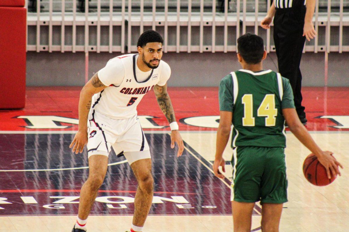 AJ Bramah dropped 18 points as the Colonials defeated Point Park 75-57 in their season debut. Photo Credit: Ethan Morrison