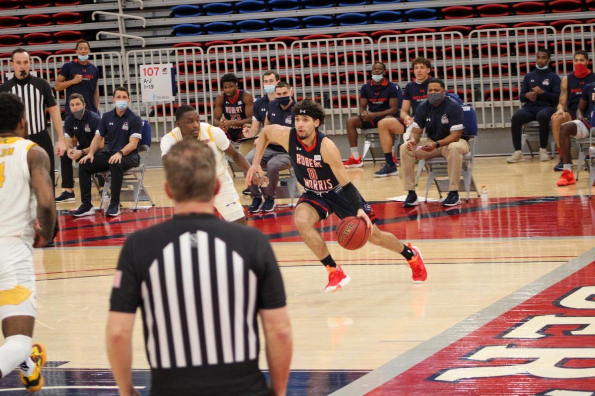 Kam Farris evades Marques Warrick of Northern Kentucky in RMUs loss on Saturday. Farris dropped 11 points. Photo Credit: Tyler Gallo