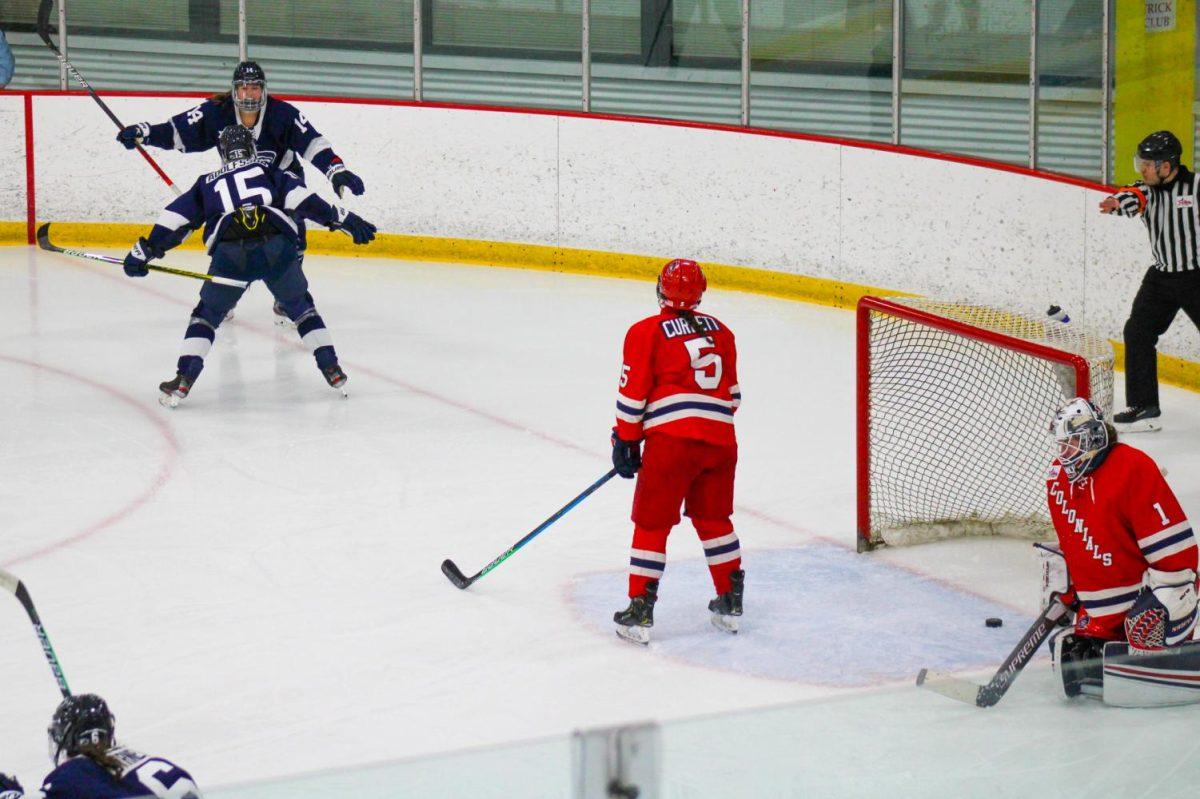 Emily Curlett and Raygan Kirk look on as  Julie Gough and Jessica Adolfsson celebrate what would be the game-winning goal on Friday night. Photo Credit: Nathan Breisinger