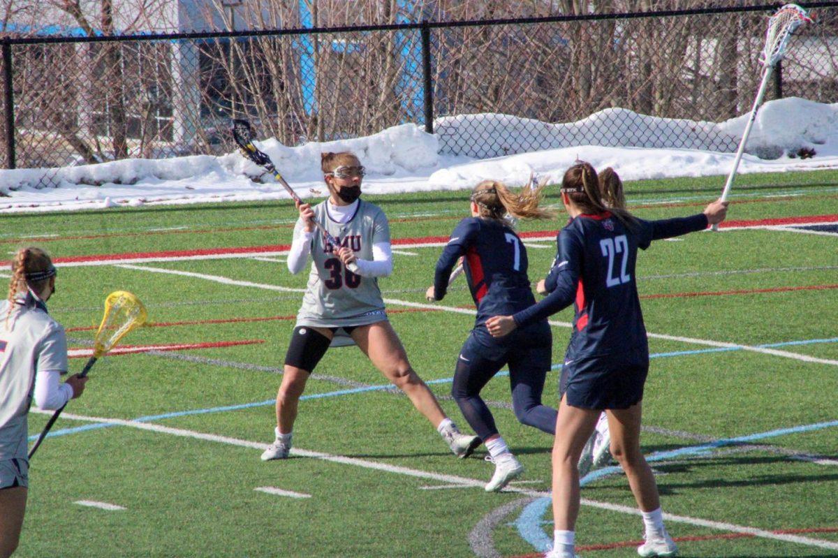 Mackenzie Gandy tied the all-time points record at RMU as the Colonials toppled Liberty 9-8. Photo Credit: Tyler Gallo