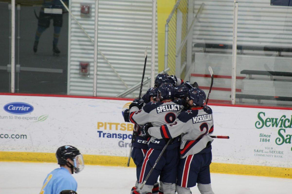 The+Colonials+celebrate+a+goal+on+Thursday+night.+Photo+Credit%3A+Ethan+Morrison