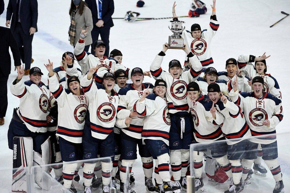 Womens hockey celebrates its championship. Photo Credit: Justin Berl