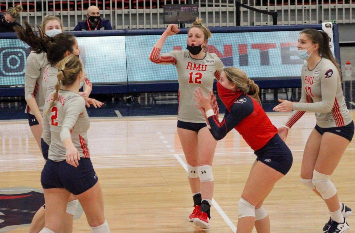 Voleyball celebrates recording one of their points in their victory over IUPUI. Photo Credit: Tyler Gallo