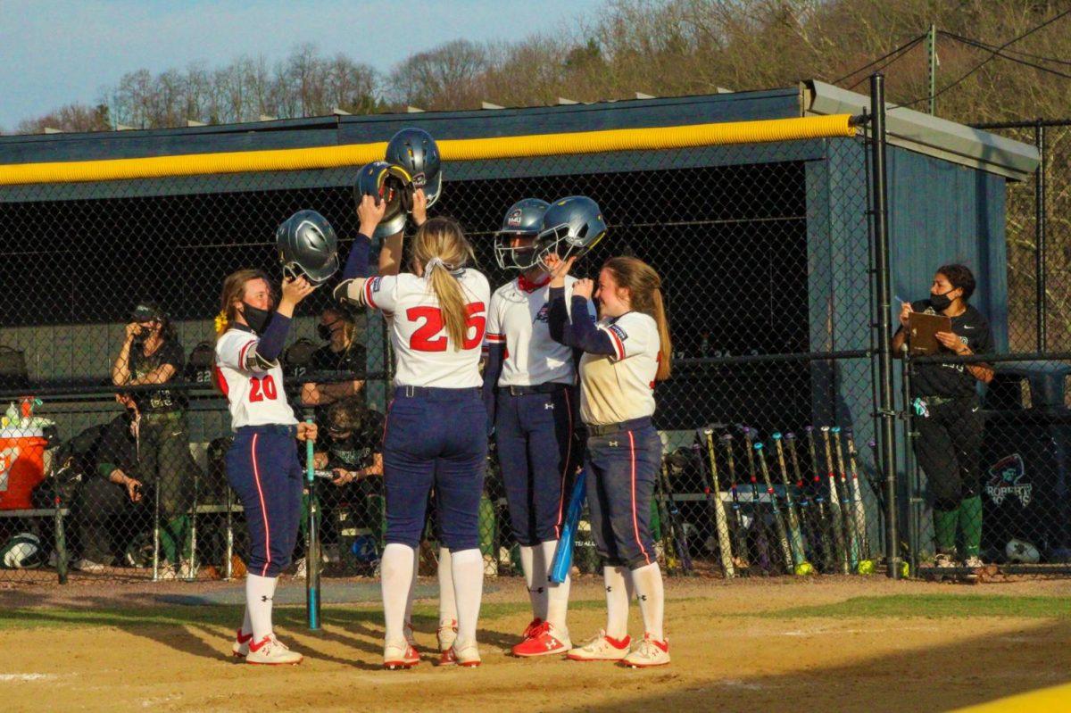 Natalie Higgins celebrates her grand slam in the bottom of the fourth inning in the second game on Tuesday. Photo Credit: Tyler Gallo