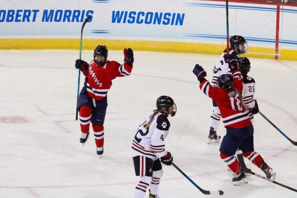 Emily Curlett celebrates the first-ever NCAA Tournament goal for the Robert Morris women’s hockey team. Erie, PA 03/15/2021 (Nate Breisinger)