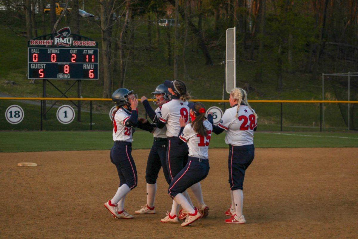 The Colonials celebrate Charlotte Grovers walk-off in game two of the doubleheader. Photo Credit: Ally Yovetich