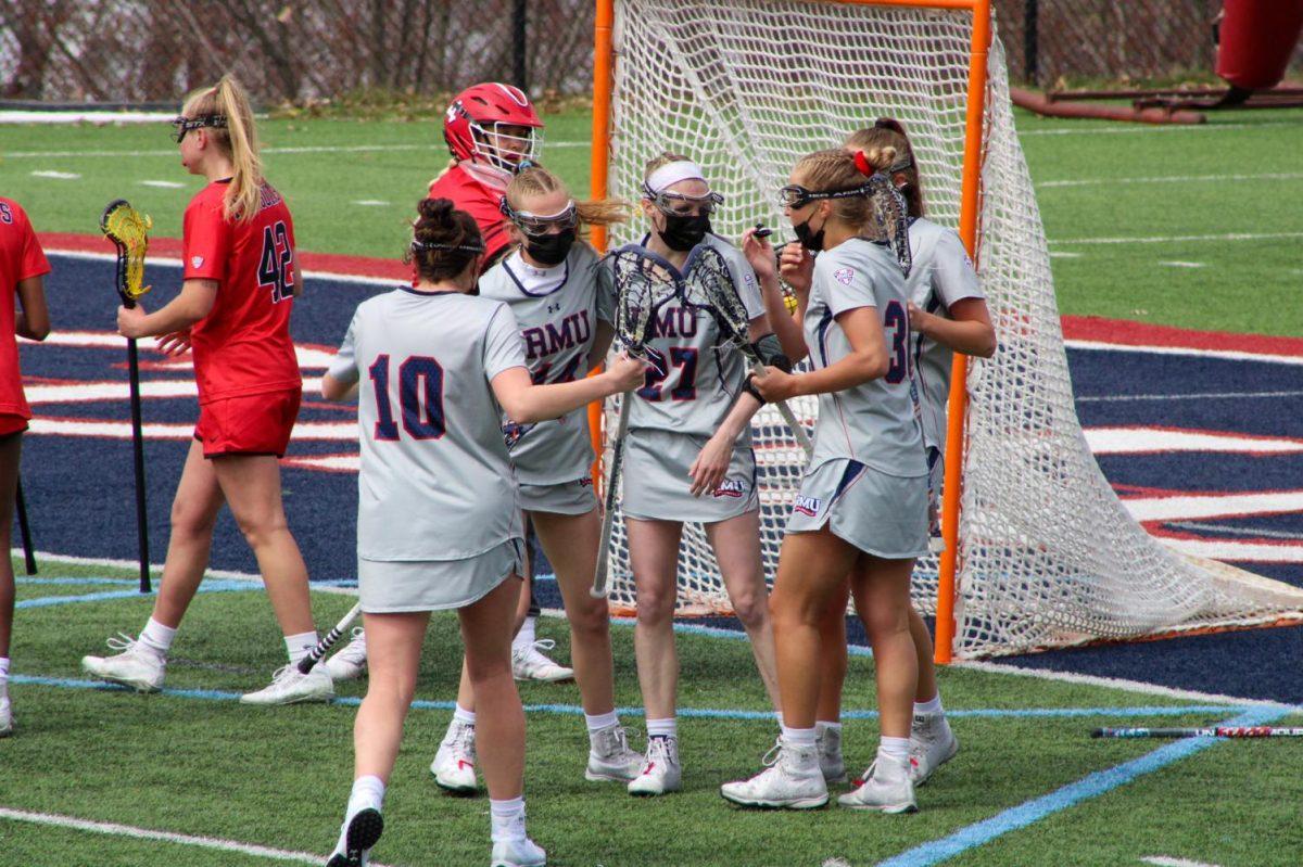 Clio Kerr celebrates one of her three goals on Saturday. Photo Credit: Tyler Gallo