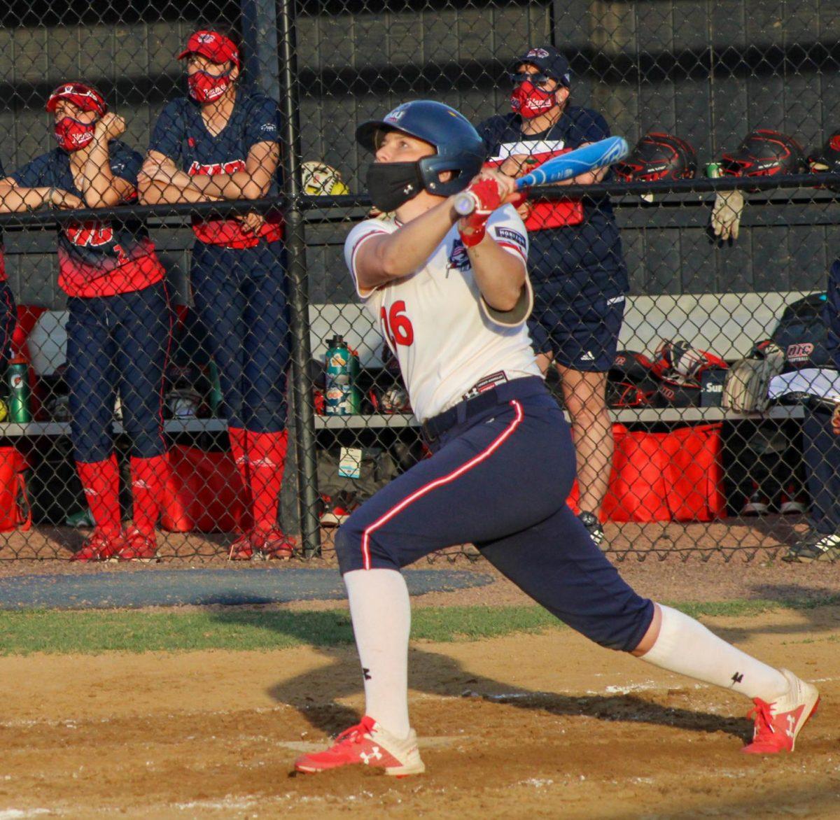 Natalie+Higgins+takes+a+swing+against+UIC.+Photo+Credit%3A+Tyler+Gallo