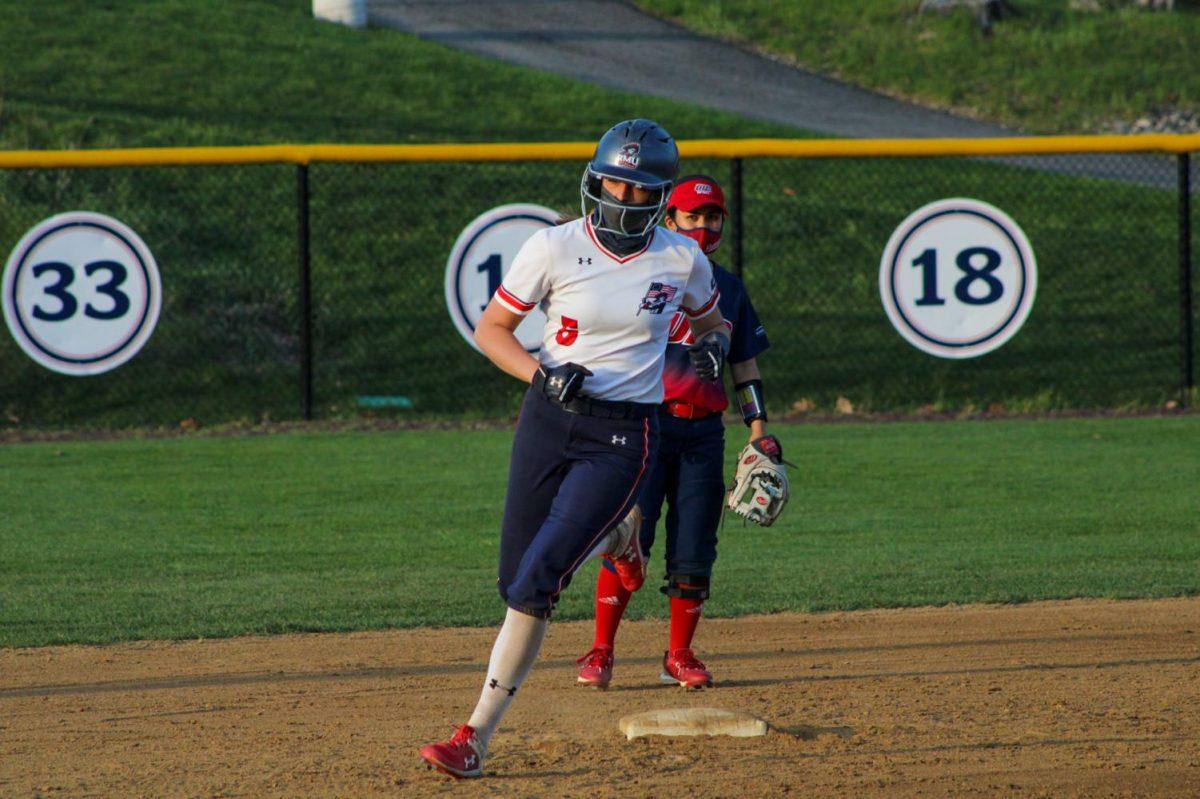 Madison Riggle rounds the bases following her home run in the second game. It stood as the game-winning run against UIC. Photo Credit: Tyler Gallo