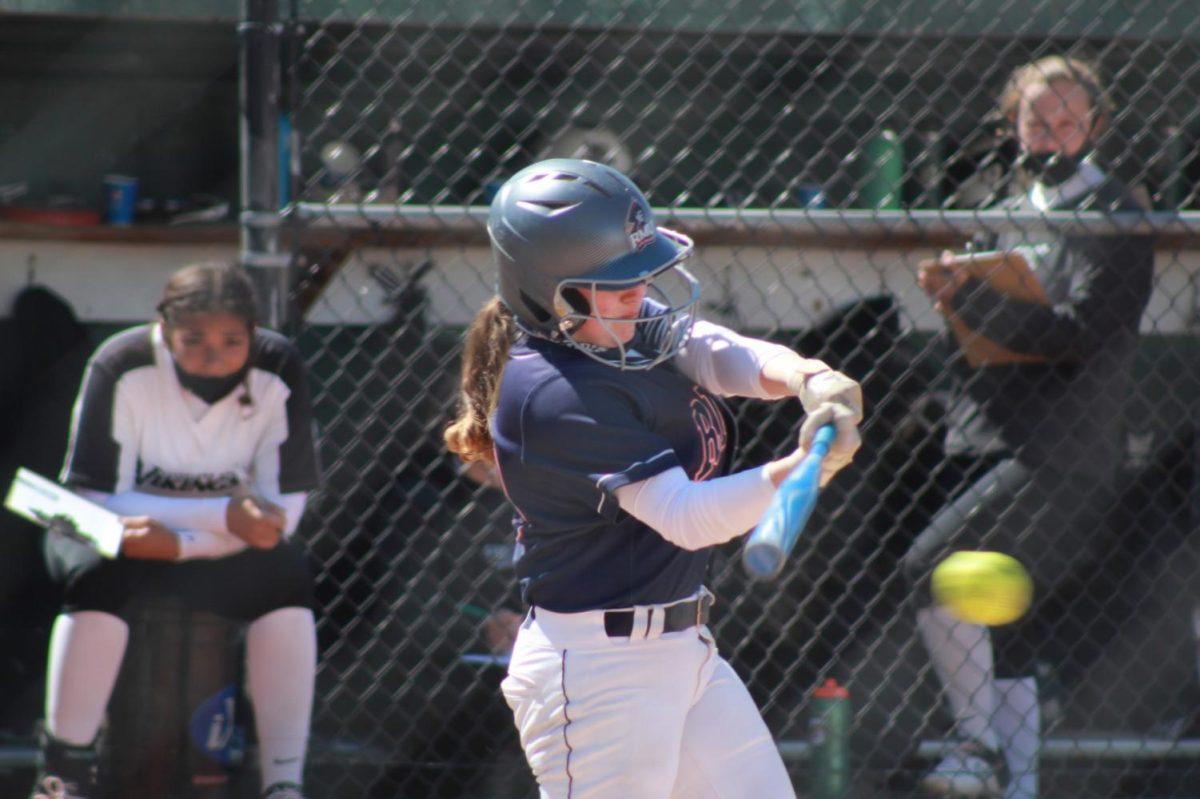 Faith Miller connects with a pitch against Cleveland State. Photo Credit: Ethan Morrison