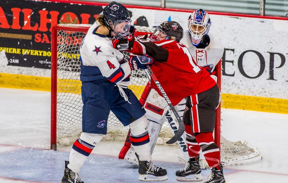 Kirsten Welsh polices the crease against St. Lawrence on September 28, 2018