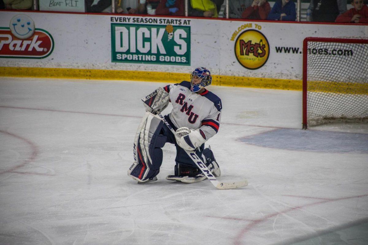 Francis Marotte takes a knee against RIT.