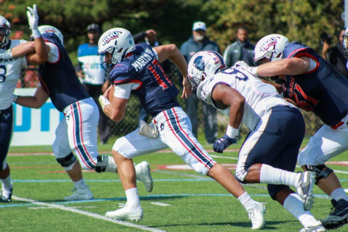 George Martin rushes the ball against Howard.