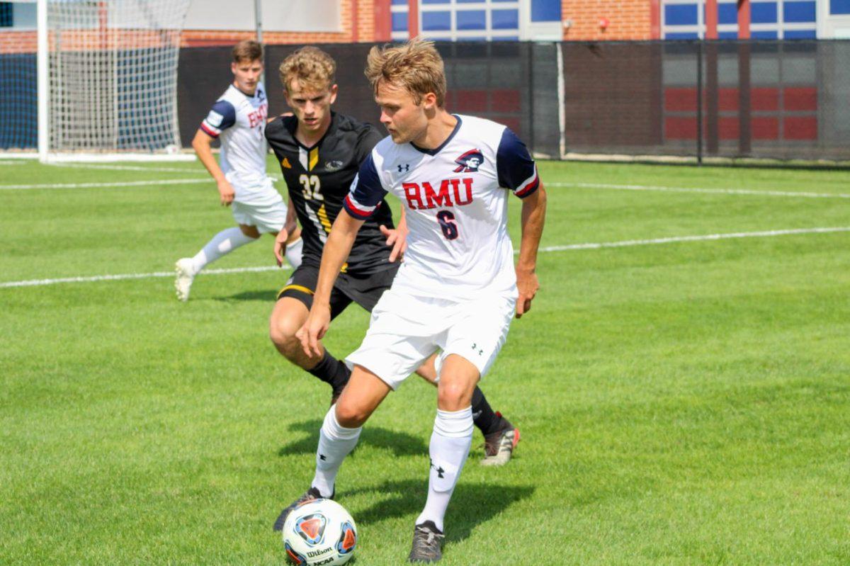 Gustaf Moberg carries the ball against Milwaukee.