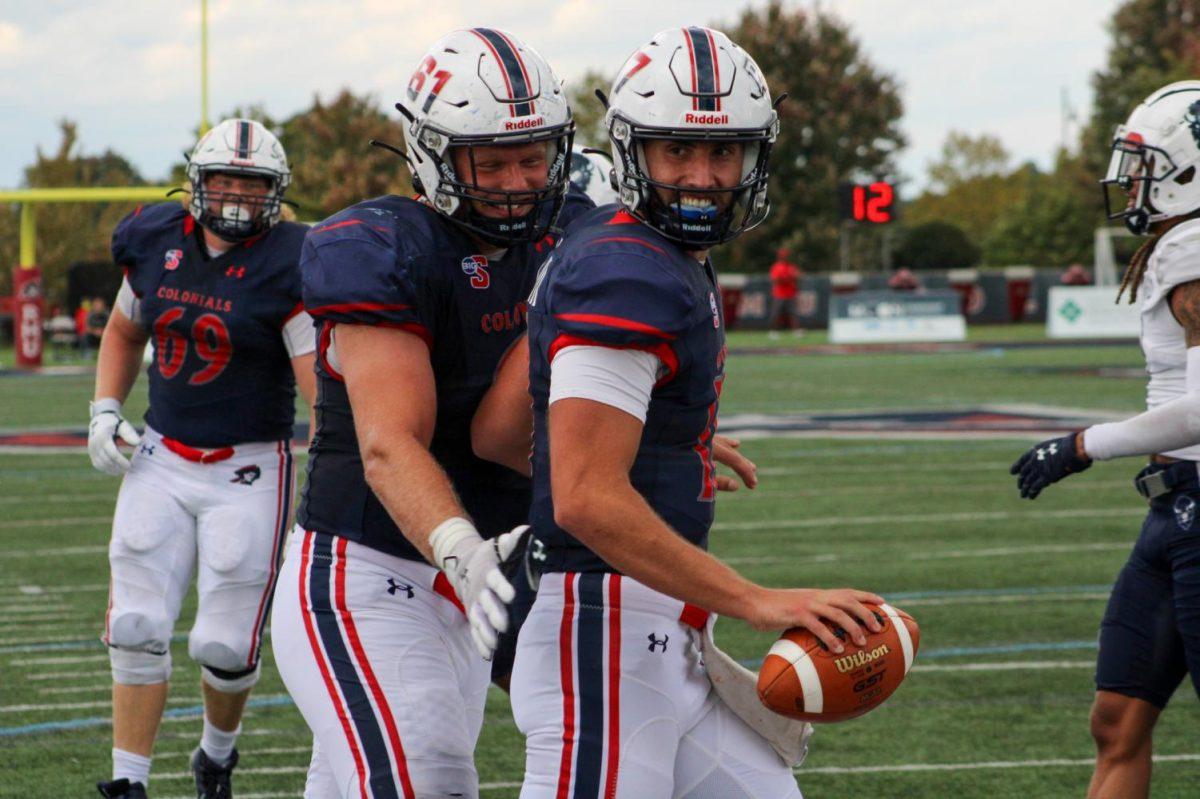 George Martin smiles after his two-point conversion to put the Colonials up six late in the fourth quarter.