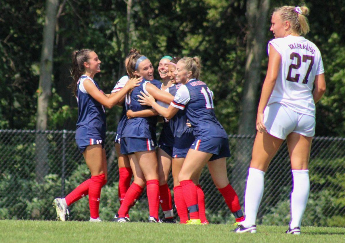 Womens+soccer+celebrates+a+goal+against+Valparaiso.