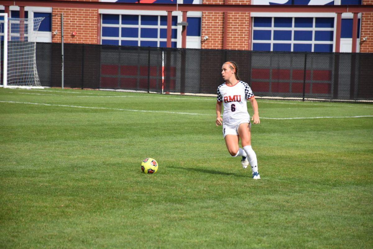 Allie+Ball+rushes+up+field.+