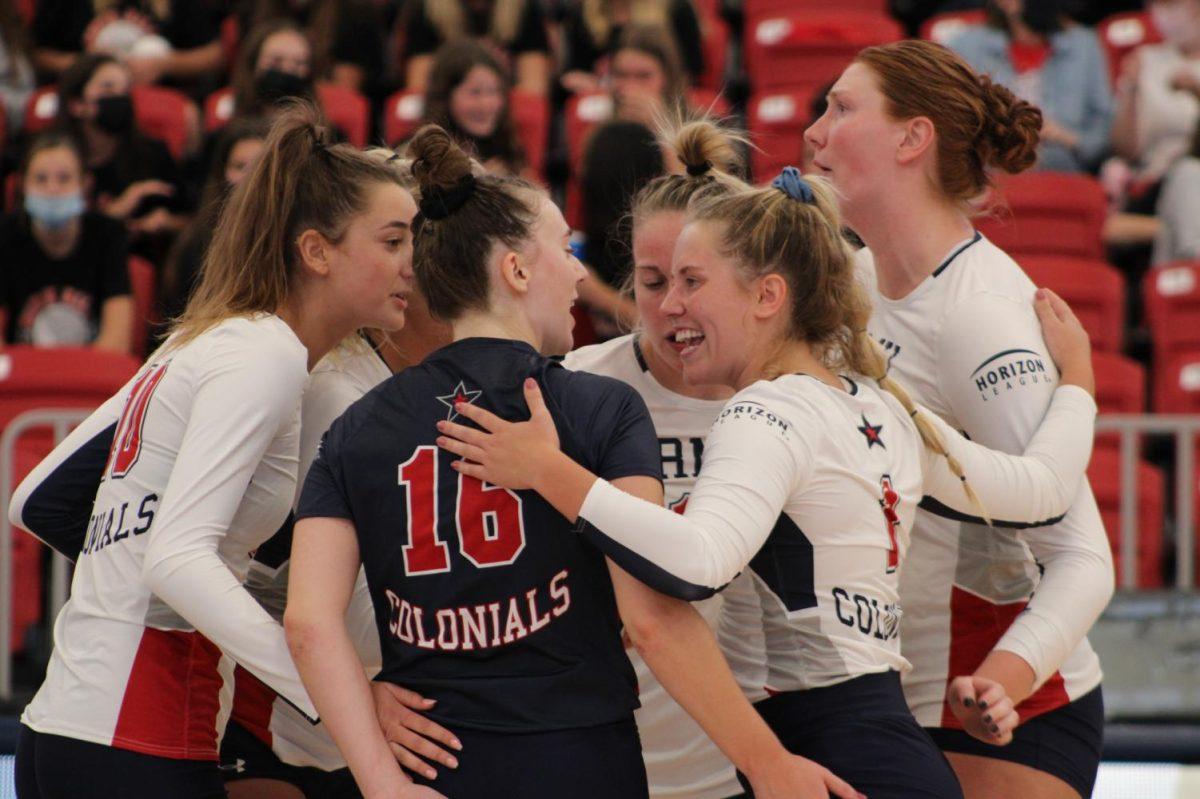 Annie Monaco, Allena Carmody, Nikolette Zanolli, Emma Granger, Megan Cannon and Ally Christman celebrate a point.