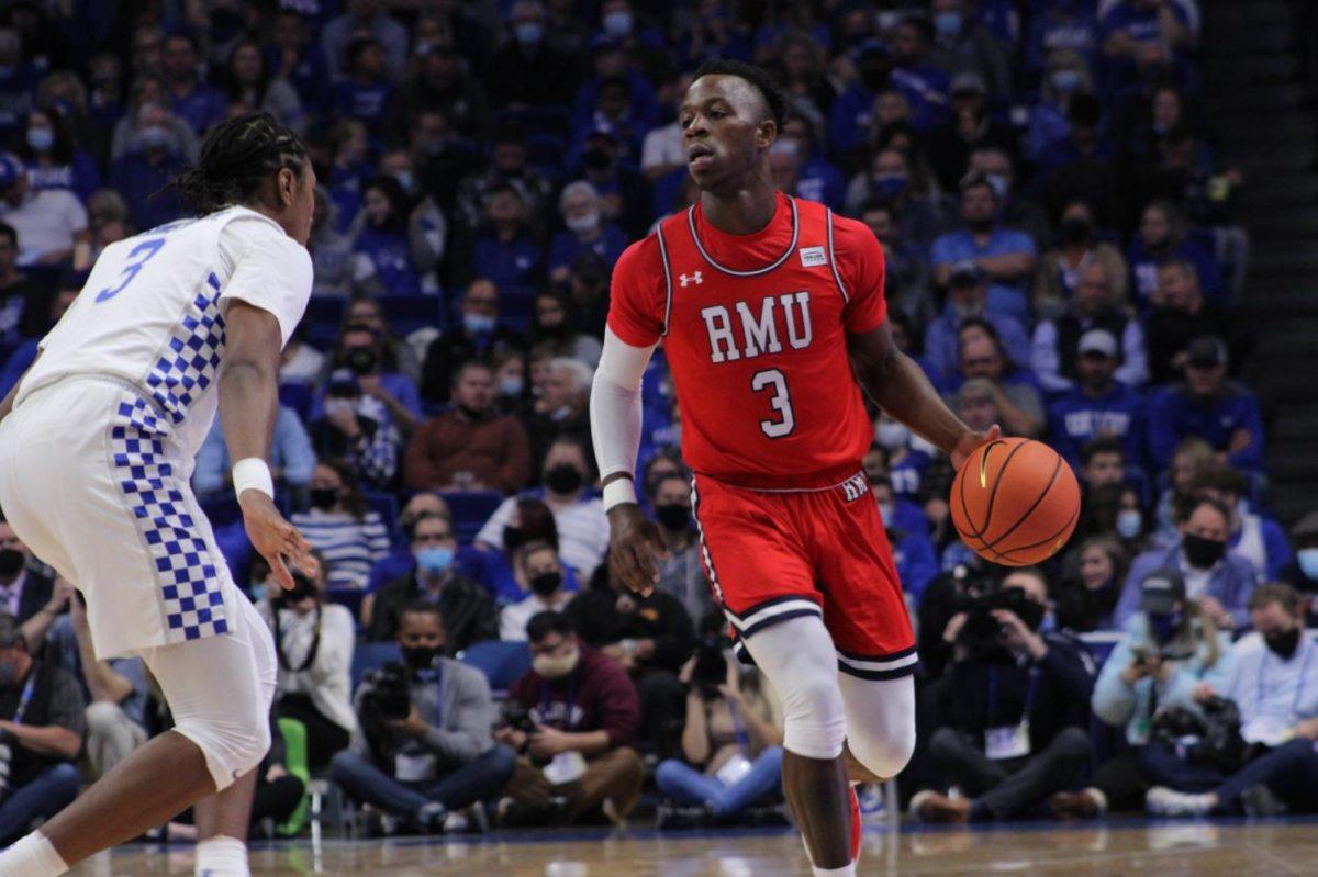 Rasheem Dunn is flanked by TyTy Washington Jr. during Fridays game. Photo credit: Tyler Gallo