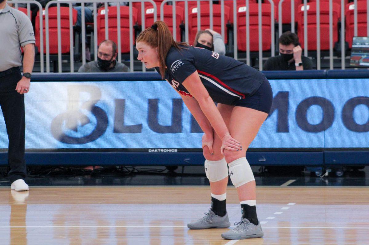 Emma Granger gets set for a point during her final match as a Colonial. Photo credit: Tyler Gallo