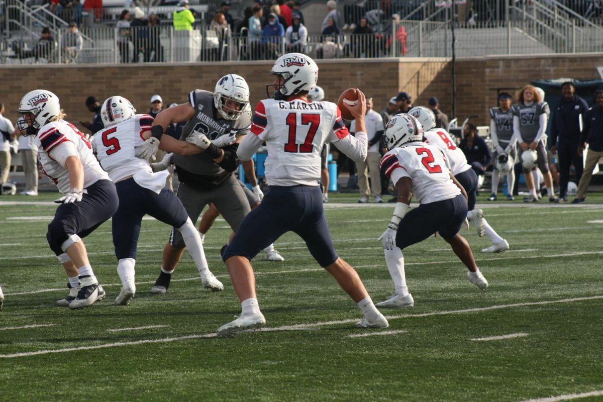 George+Martin+III+throws+the+ball+against+Monmouth.+Photo+Credit%3A+Jonathan+Hanna