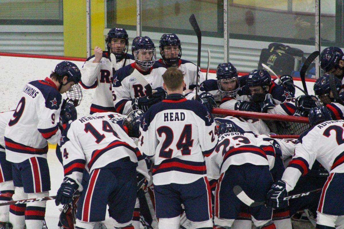 Men’s hockey gathers before their playoff game against Niagara. Photo credit: Tyler Gallo