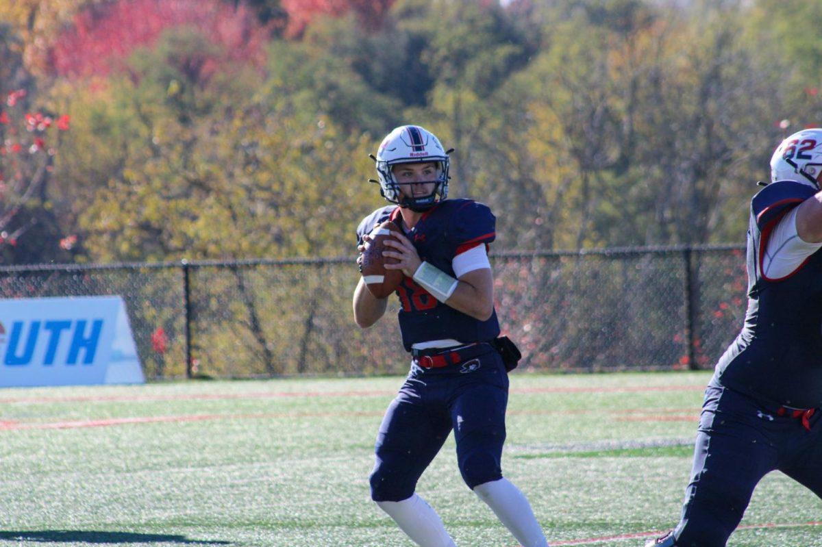 Corbin LaFrance drops back for a pass against Kennesaw State. Photo credit: Tyler Gallo