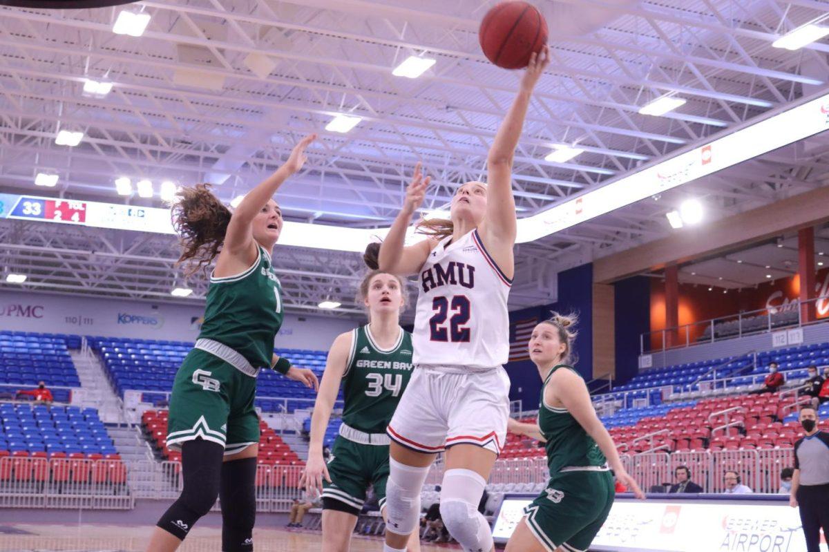 Esther Castedo drives to the hoop. Photo credit: Ethan Morrison