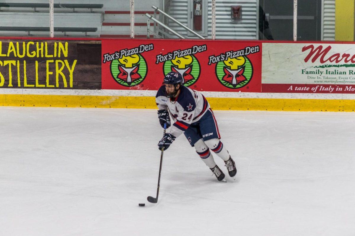 Alex Tonge carries the puck against Niagara. Photo credit: David Auth