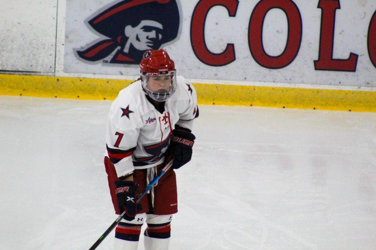 Wasyn Rice sets up for a faceoff against RIT. Photo credit: Ethan Morrison