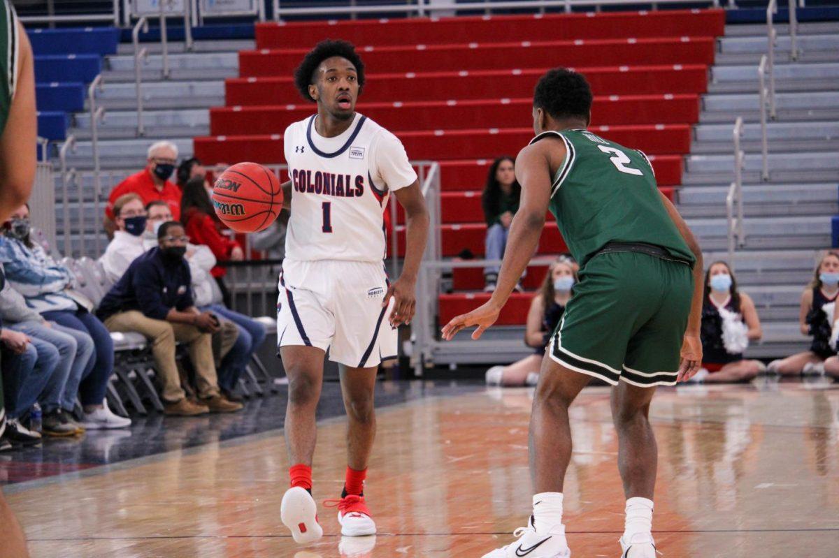 Michael Green III holds the ball against Cleveland State. Photo credit: Tyler Gallo