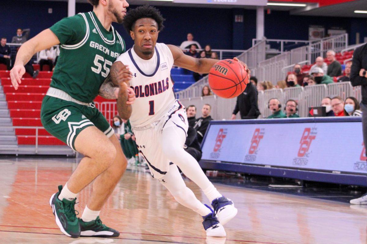 Michael Green III charges to the hoop against Green Bay. Photo credit: Tyler Gallo