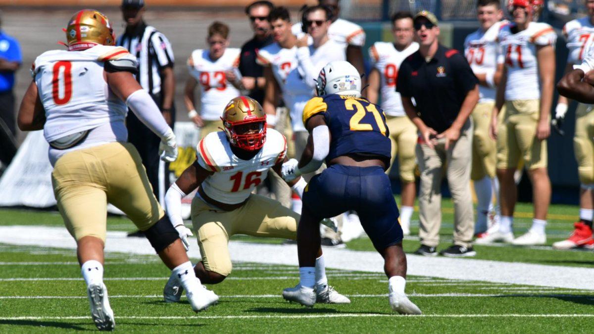 Will Bunton attempts to tackle Joachim Bangda of Kent State. Photo credit: VMI Athletics