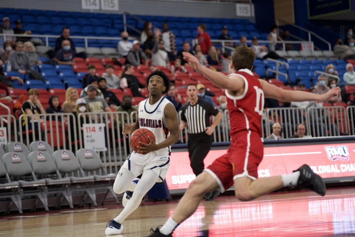 Michael Green III runs down a layup against IUPUI. Photo Credit: Justin Newton