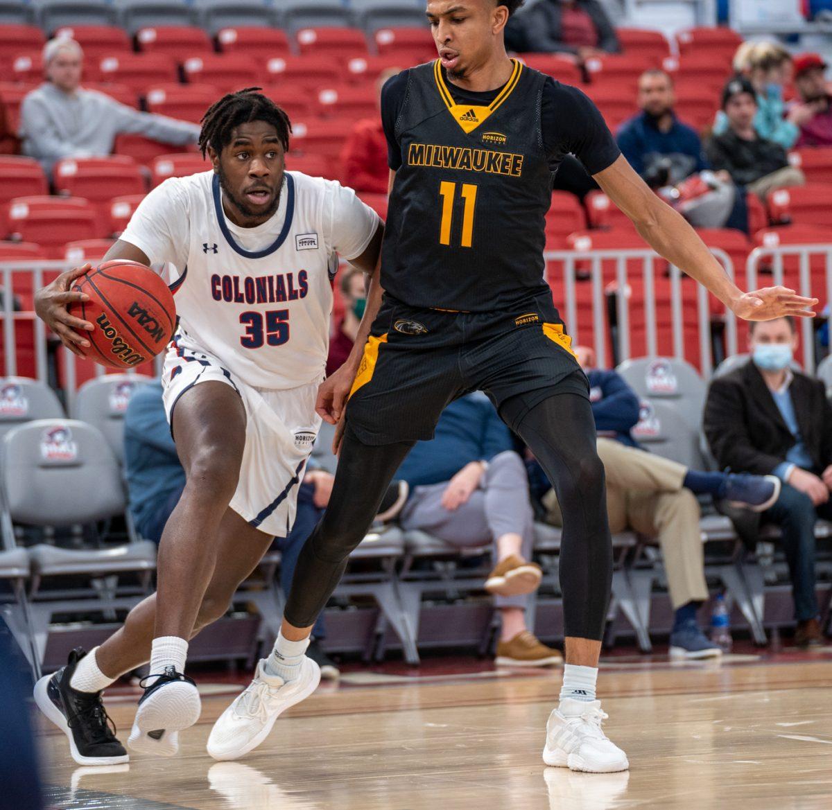 Justin Winston drives against Milwaukee. Photo credit: Justin Newton