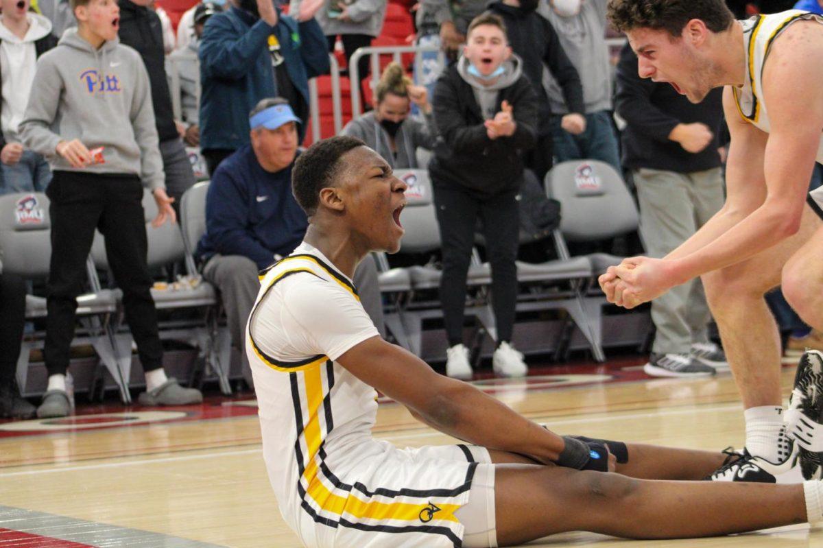 Adou Thiero celebrates an and-one against Lincoln Park. Photo credit: Tyler Gallo