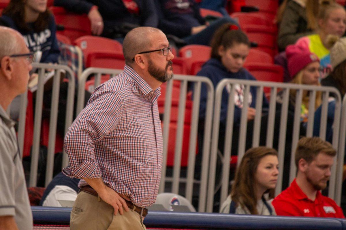 Dale Starr watches his team against Central Connecticut State. Photo credit: Michael Sciulli