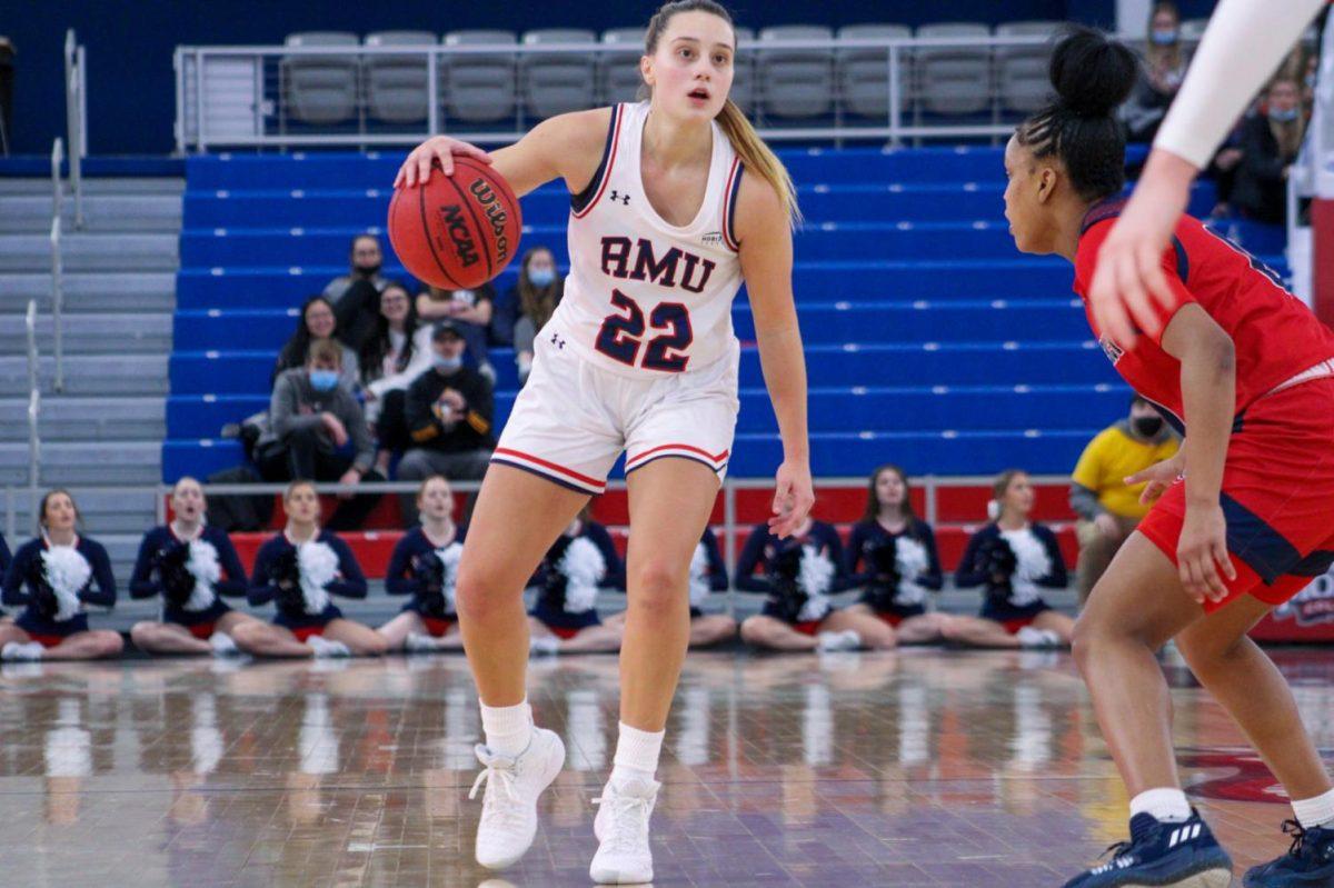 Esther Castedo sets up against Detroit Mercy. Photo credit: Tyler Gallo