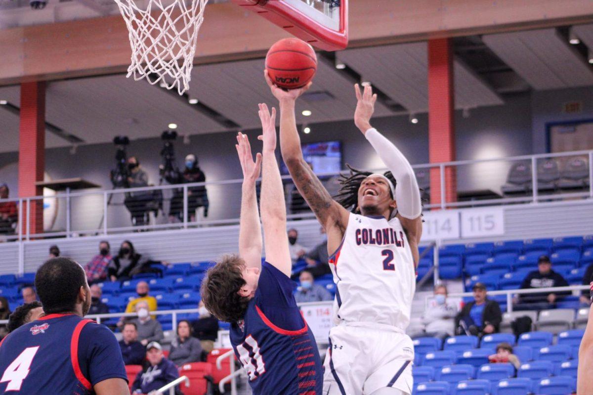 Kahliel Spear attempts a layup against Detroit Mercy. Photo credit: Tyler Gallo