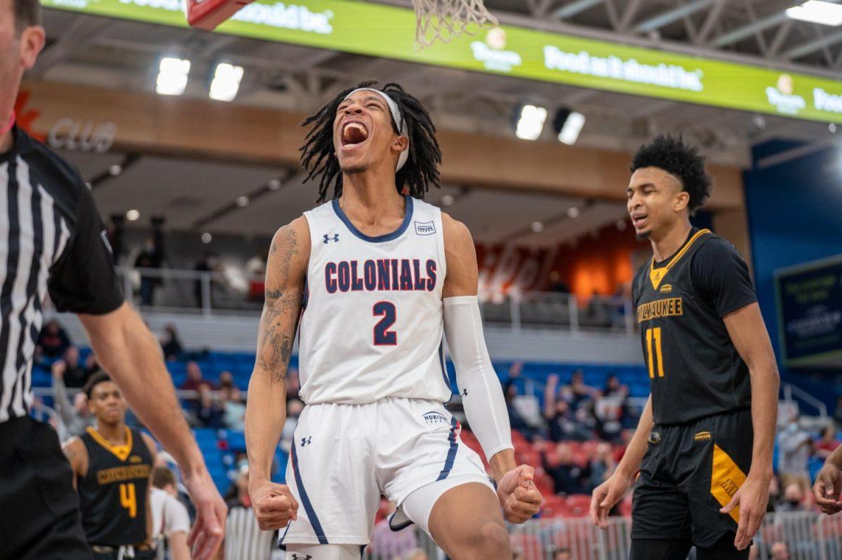 Kahliel Spear celebrates a dunk against Milwaukee. Photo credit: Justin Newton