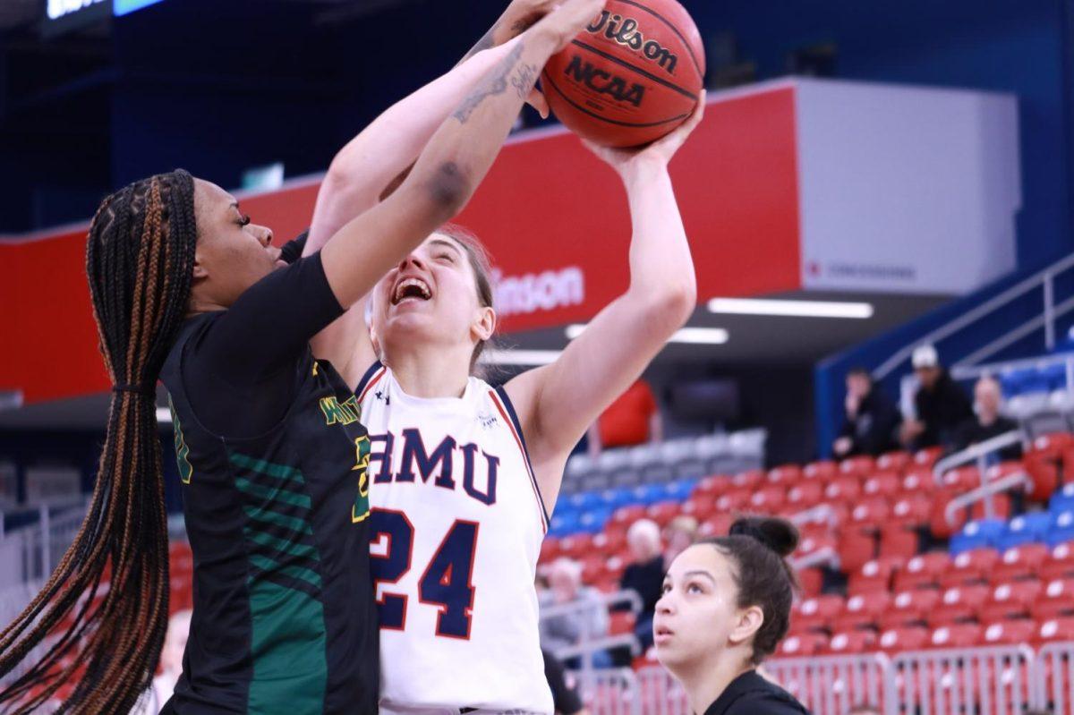 Sol Castro goes up for a contested shot in RMUs 63-54 win over Wright State. Photo credit: Ethan Morrison