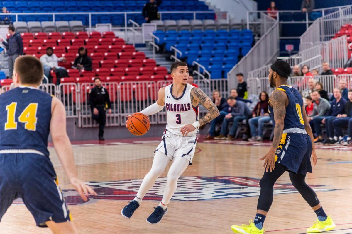 Dante Treacy looks for a lane against Merrimack. Photo credit: David Auth